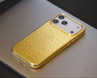 Gold phone case with crocodile texture on a metallic surface